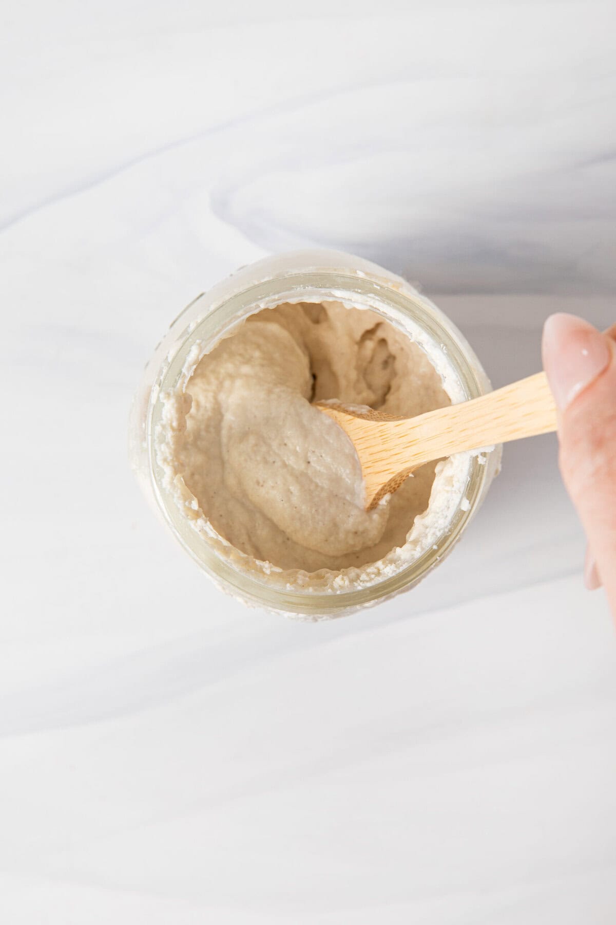 Gluten free sourdough discard in a jar.