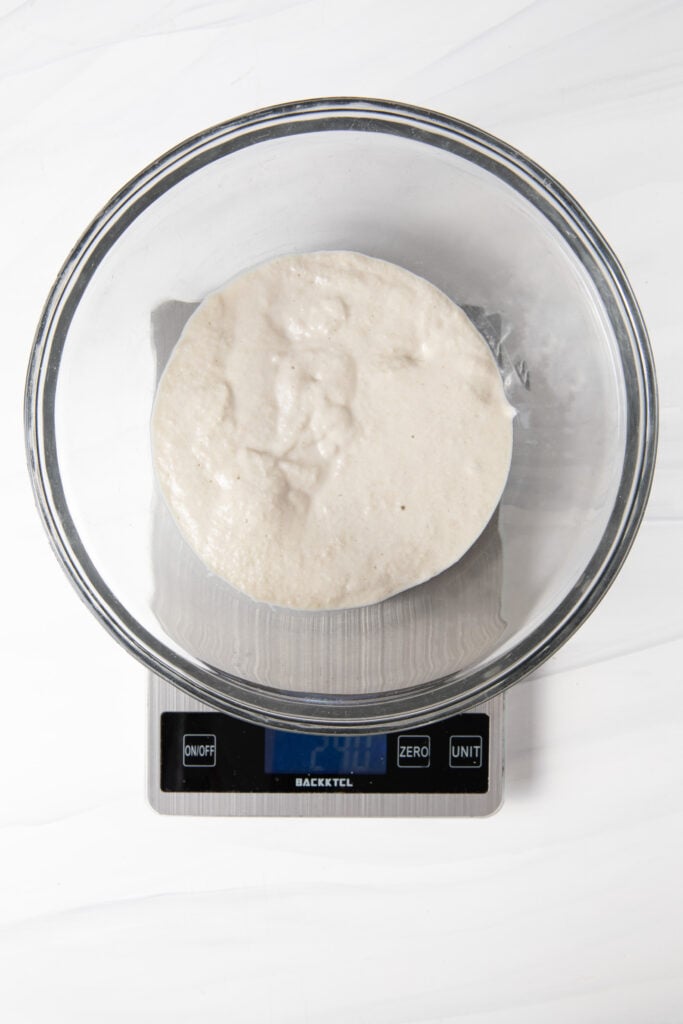 Add mixed sourdough discard into a bowl.