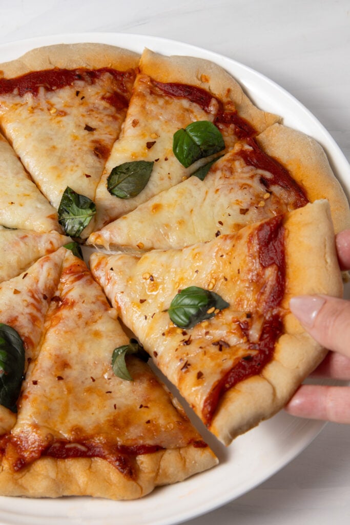 Gluten Free Sourdough Discard Pizza Crust for Sourdough Pizza on a platter.