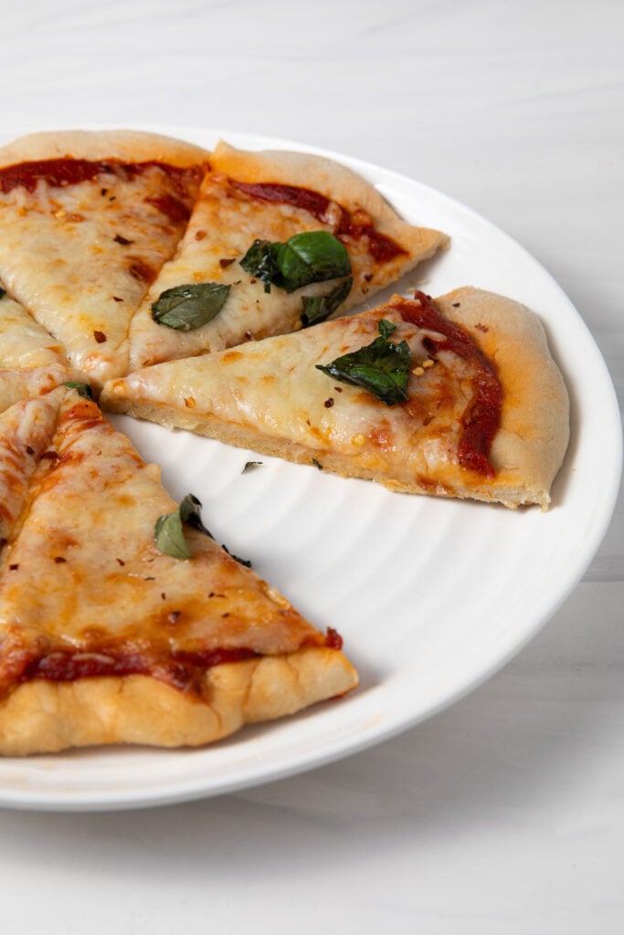 Gluten Free Sourdough Discard Pizza Crust for Sourdough Pizza with a missing slice.
