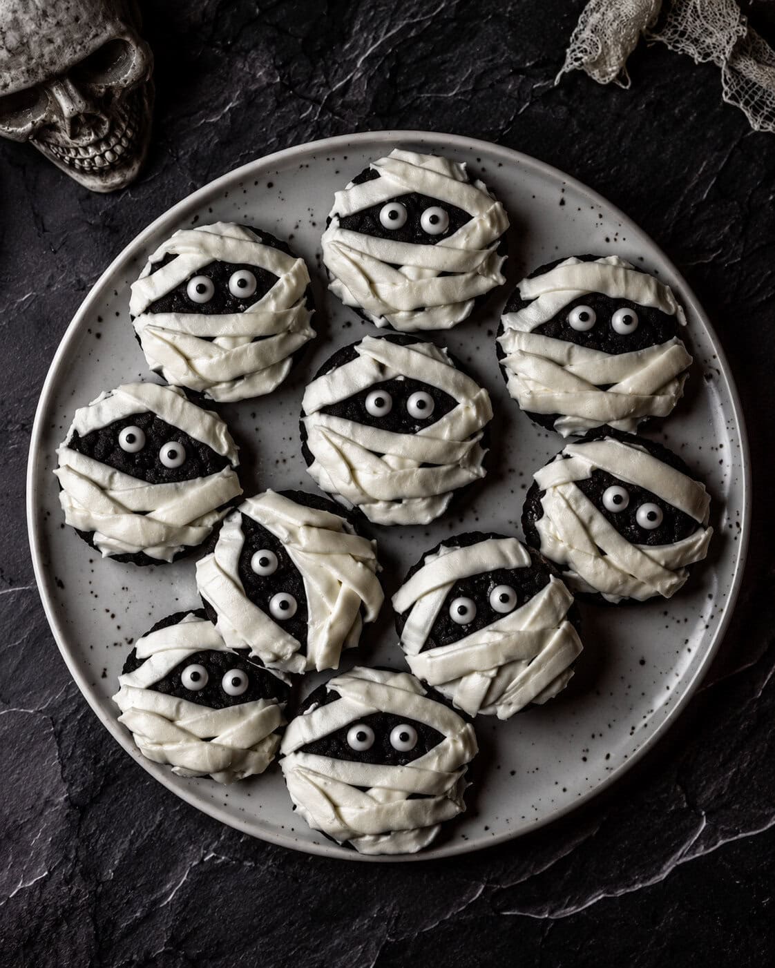 halloween mummy cookies on a plate