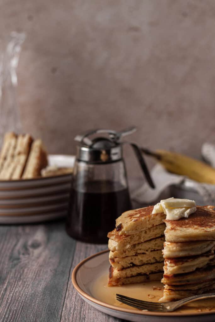 low fodmap pancakes on a breakfast table with syrup
