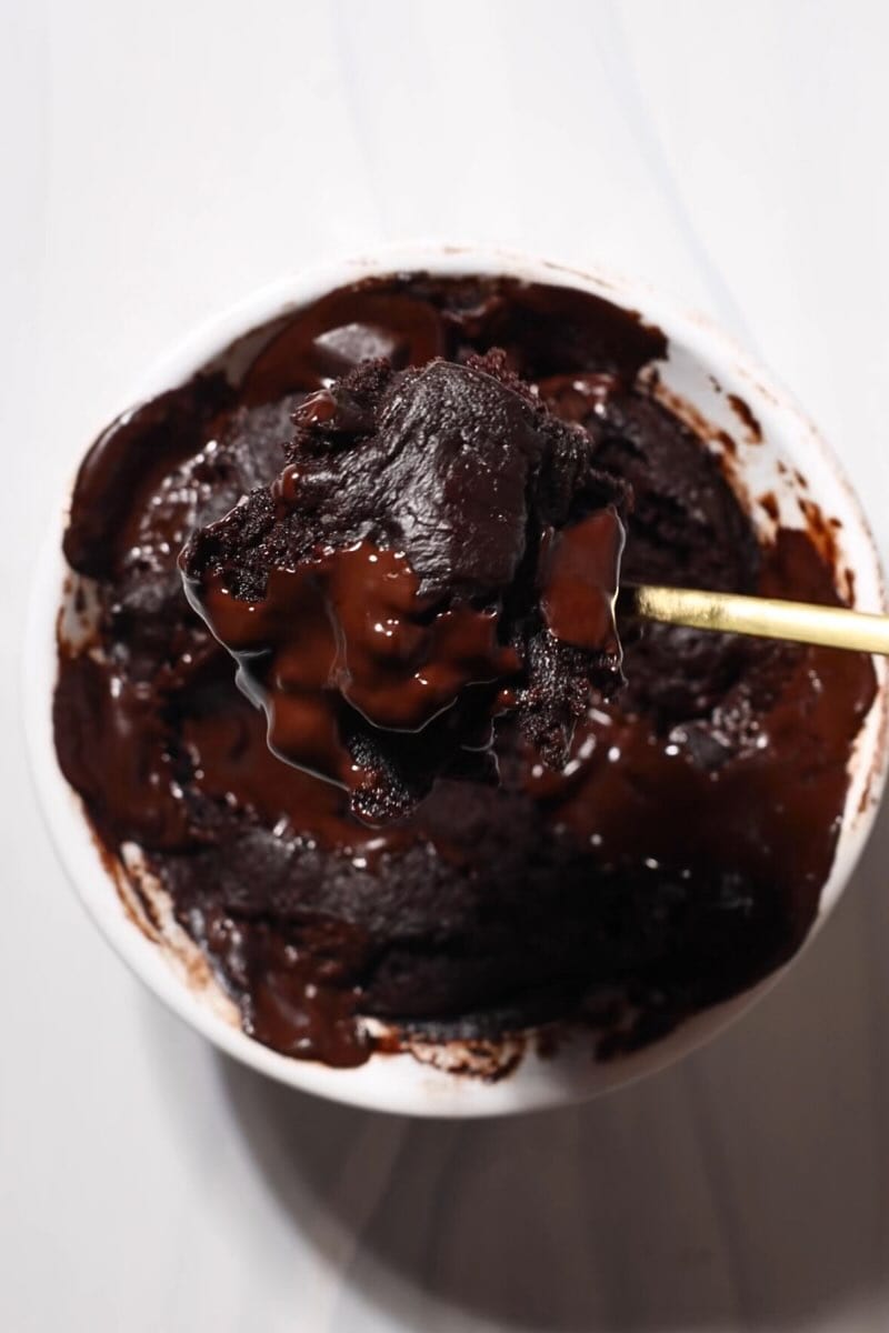 fudgy bite of mug brownie on a spoon