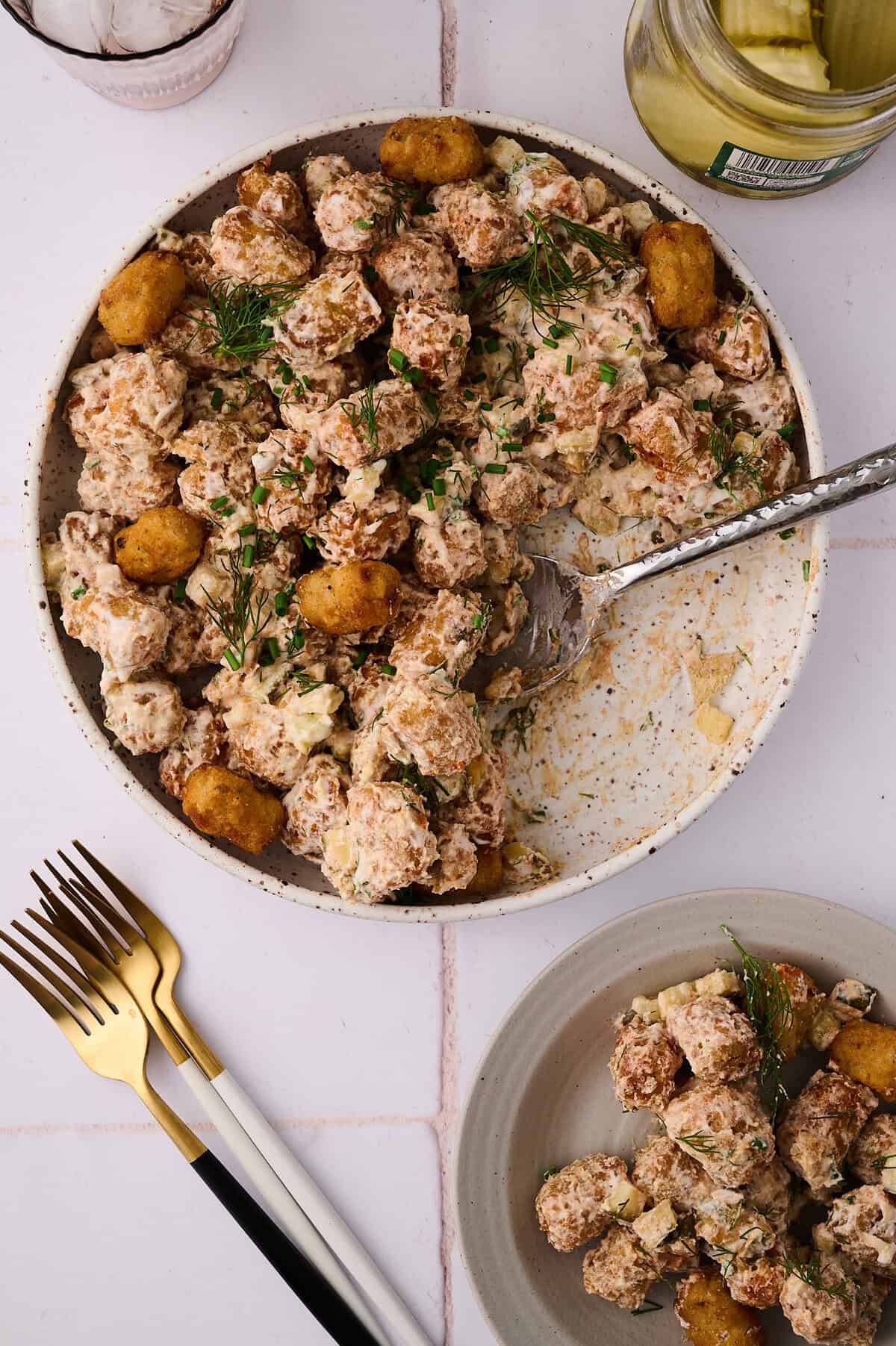 crispy tater tot potato salad with a scoop on a plate