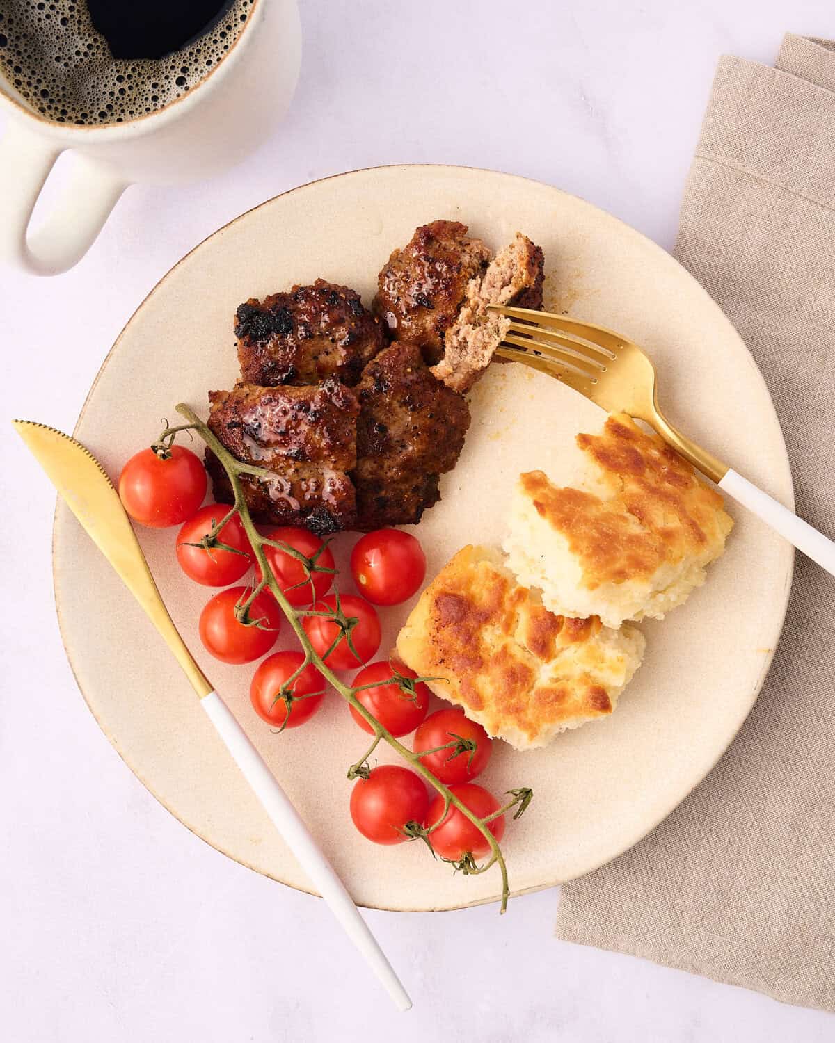 turkey breakfast sausage patties on a plate with breakfast foods