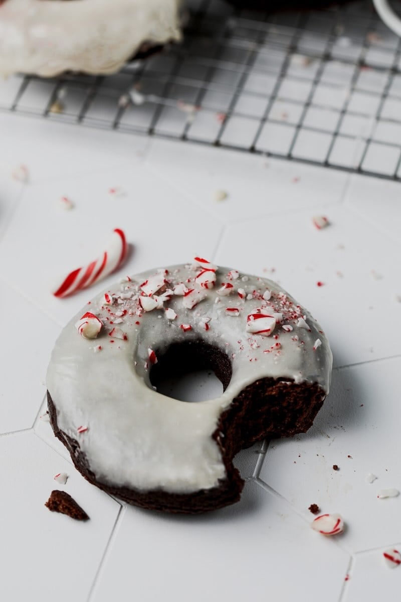 gluten free christmas donuts covered in candy cane pieces