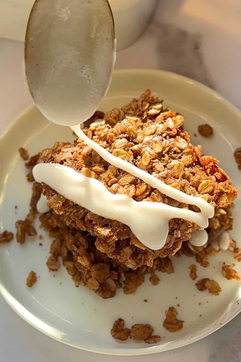 cinnamon roll baked oatmeal with icing drizzle