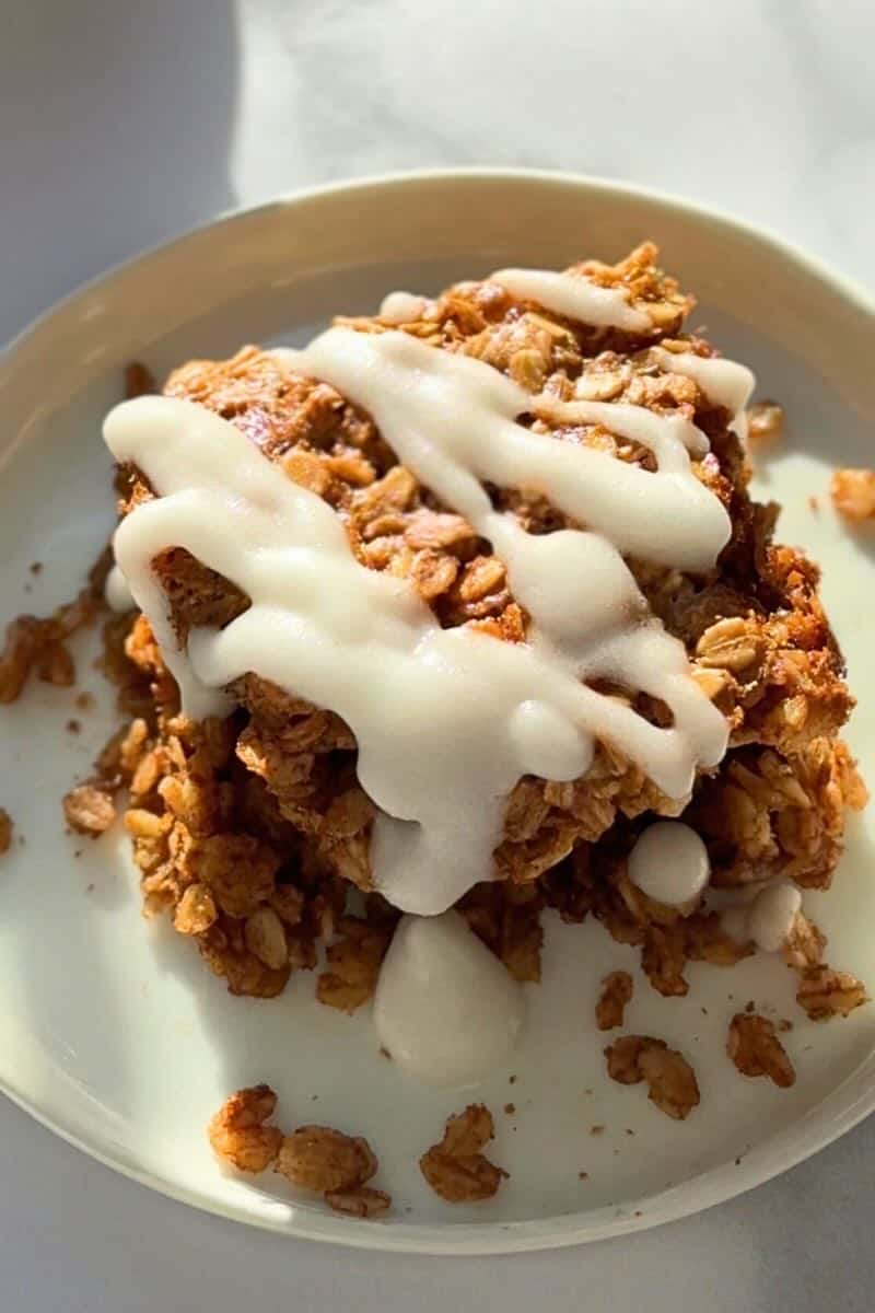 cinnamon roll baked oatmeal on a plate