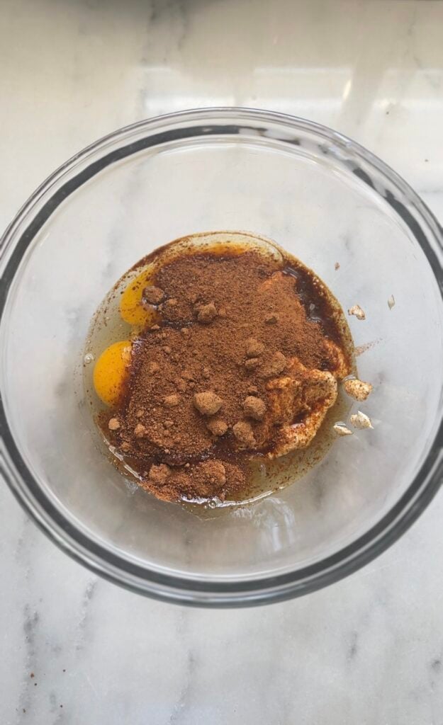 Add coconut sugar to the wet ingredients of the high protein carrot cake into a bowl.