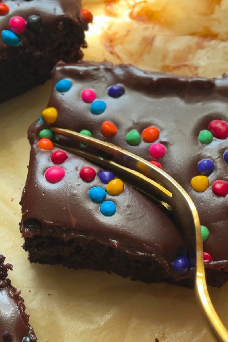 fork slicing into protein gluten free cosmic brownies.