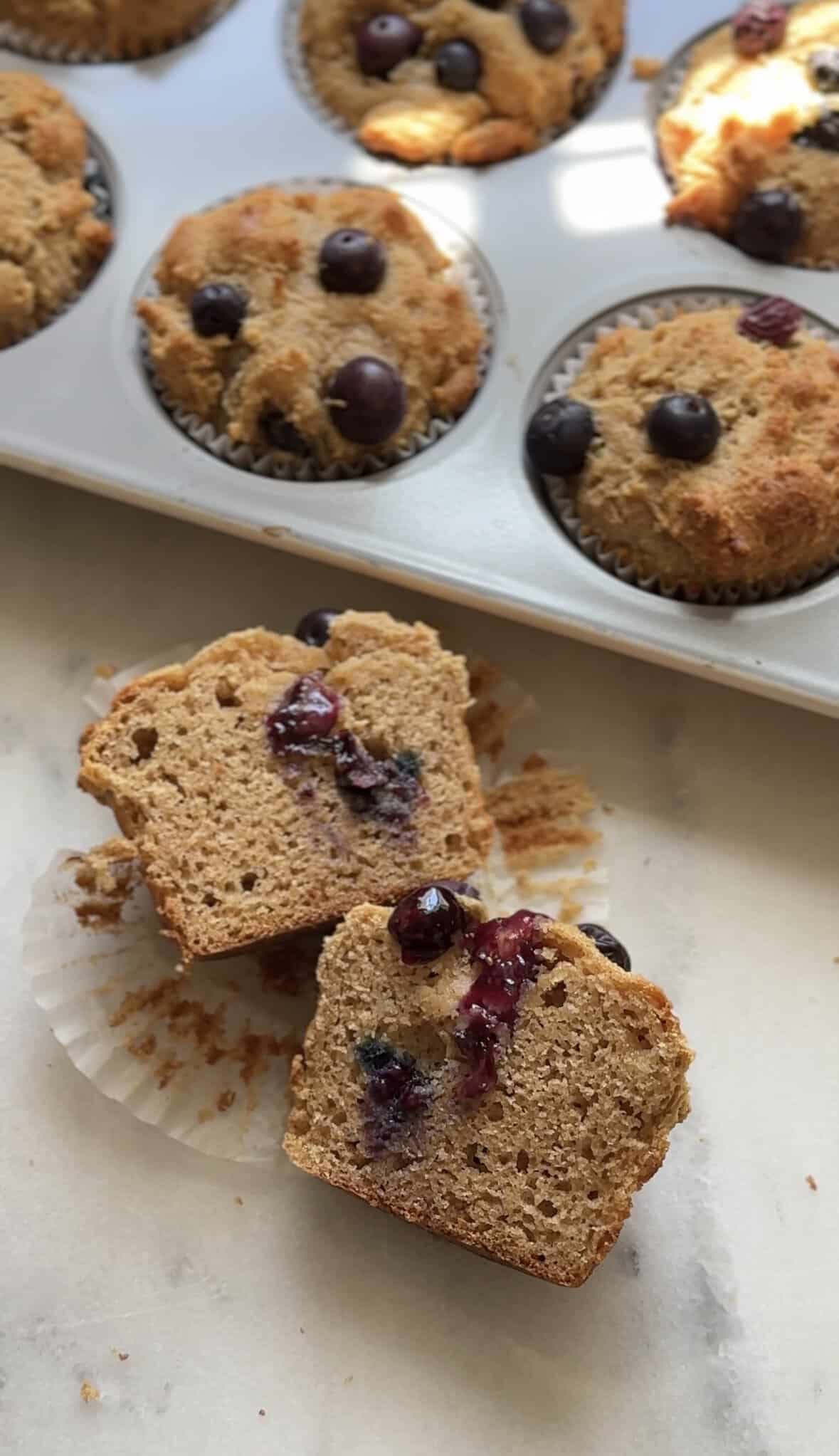Finished and cut in half of a Gluten Free Blueberry Cottage Cheese Protein Muffin.