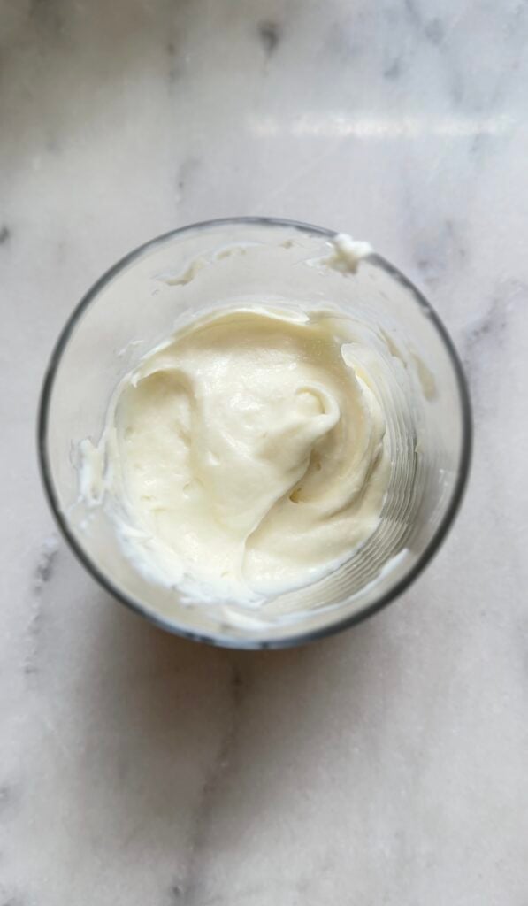 Picture of the bottom layer of the easy protein banana pudding base in a bowl or glass.