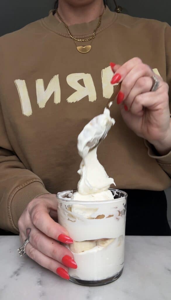 Do the second layer of the easy protein banana pudding base on top of the first layer of banana and gluten-free vanilla wafers in a bowl or glass.