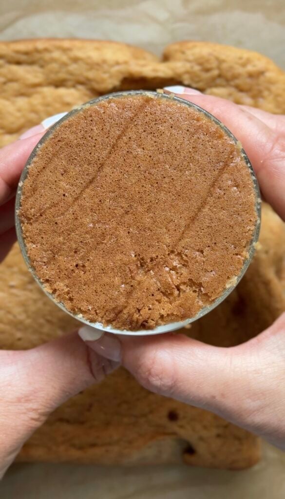 Cut out the dairy free and gluten free cake using the glass or ramekin, making sure the cake is near the top of the glass.