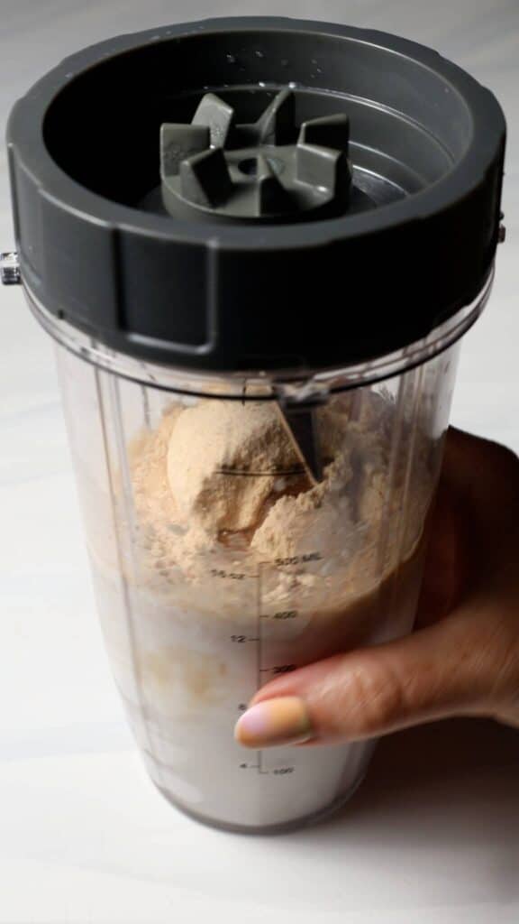 Blend the Birthday Cake Batter Protein Ninja Creami Ice Cream base in the blender bottle.