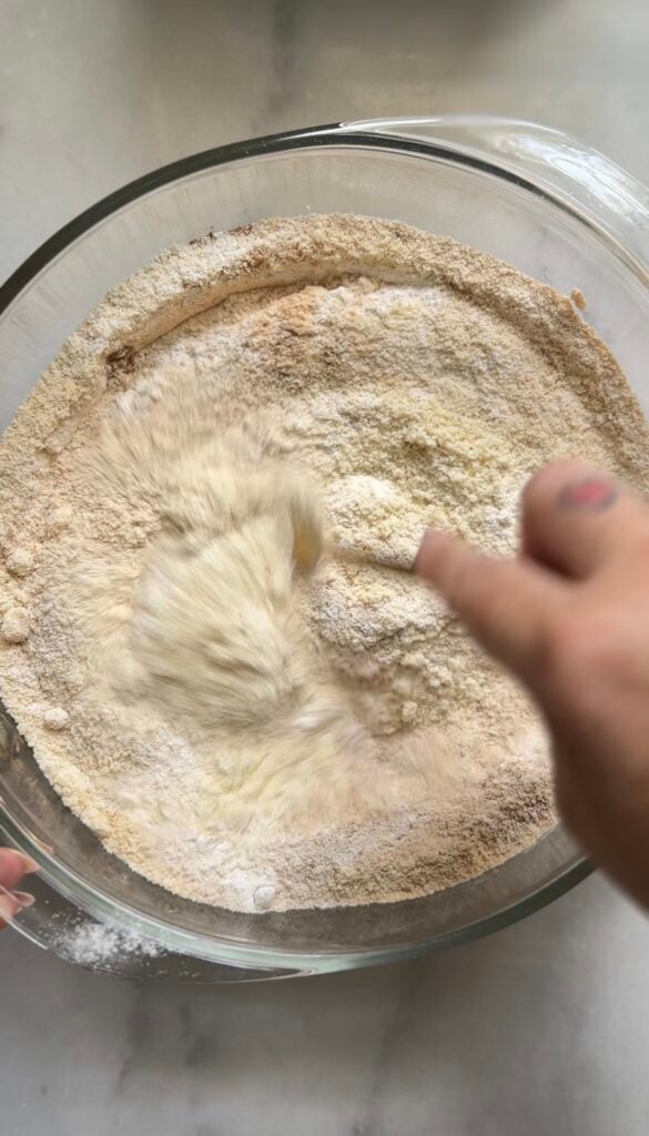 Mixing the dry ingredients for the Gluten Free Protein Banana Nut Bread batter.