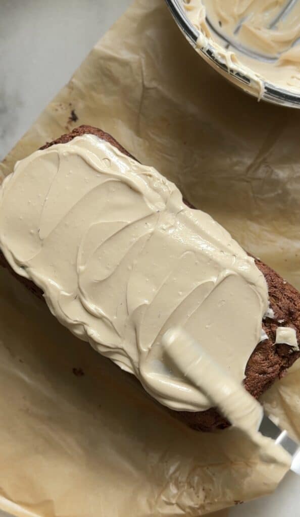 Frosted the Gluten Free Protein Banana Nut Bread with the cream cheese frosting.
