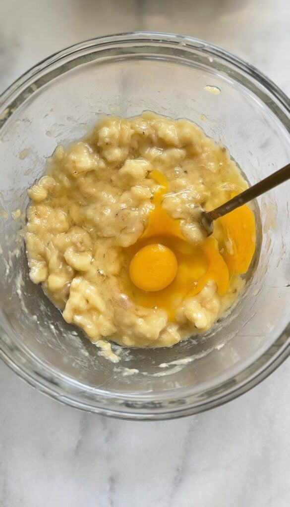 Add the wet ingredients in a bowl for the Gluten Free Protein Banana Nut Bread batter.