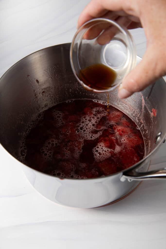 Add vanilla in a saucepan to make the Fresh Strawberry Simple Syrup.