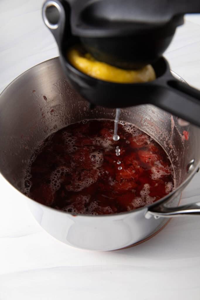 Add lemon juice in a saucepan to make the Fresh Strawberry Simple Syrup.