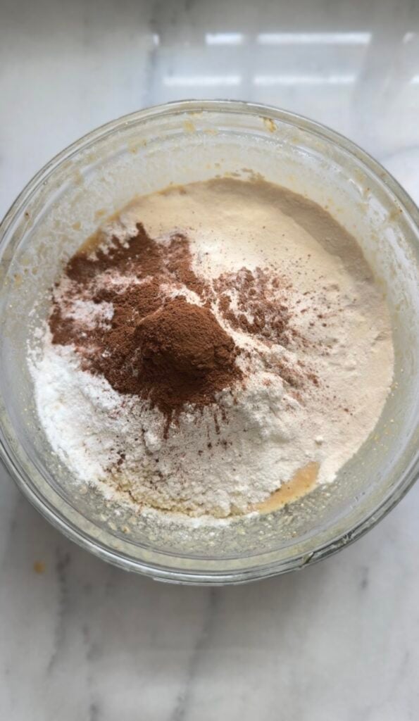 Add dry ingredients to the bowl of the batter.