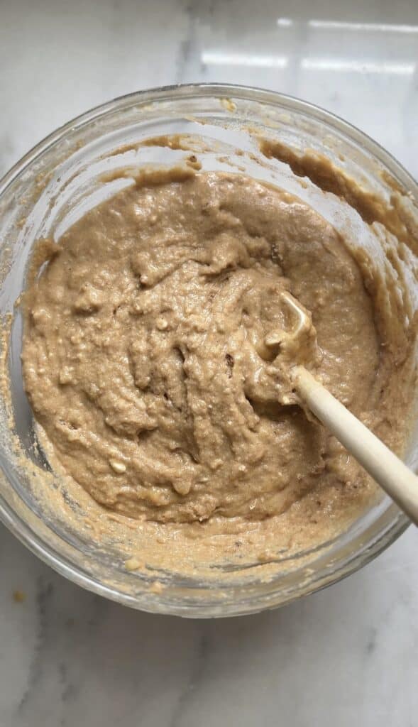 Fold the Protein Cottage Cheese Banana Muffins batter in the bowl before the chocolate and nuts.