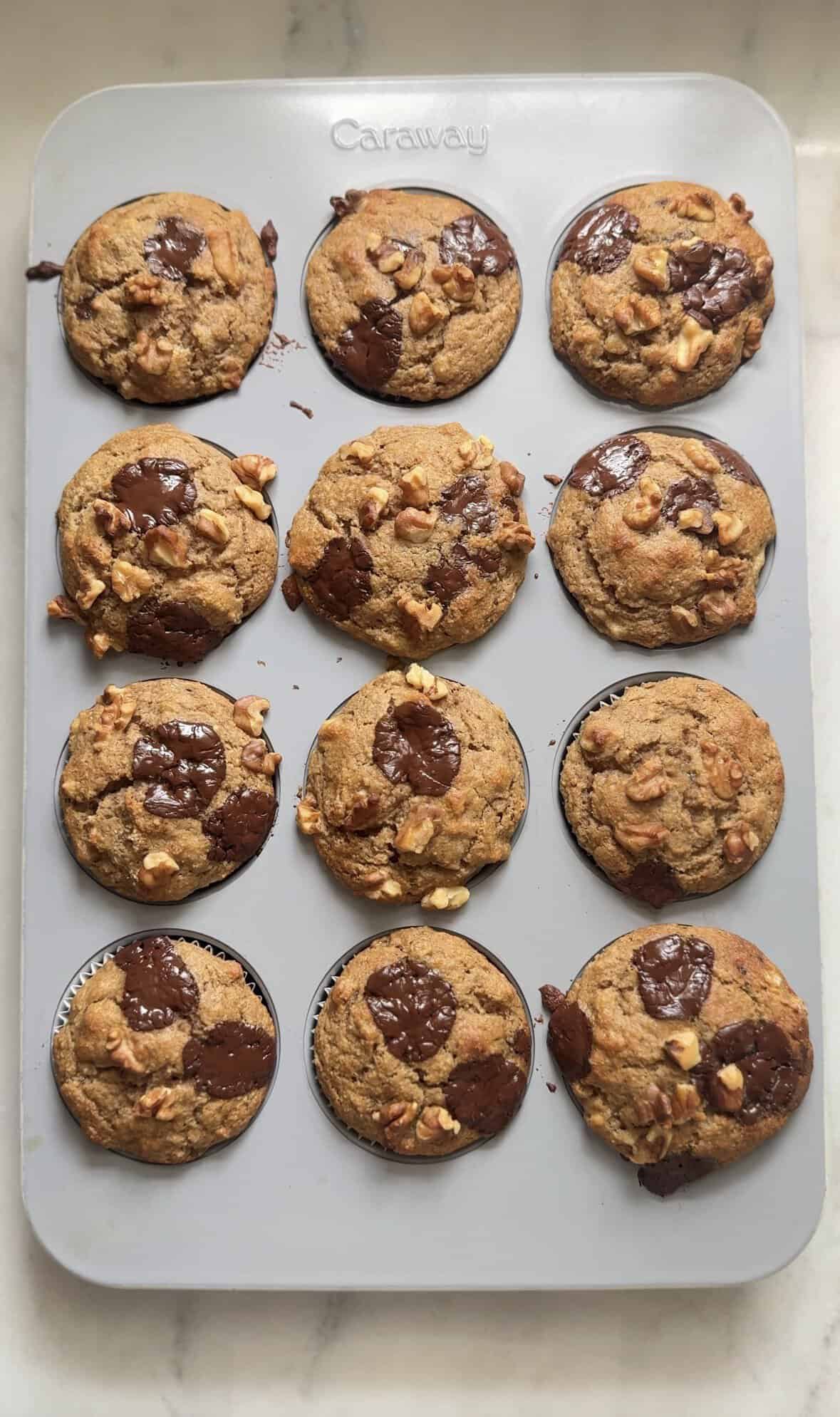 12 Protein Cottage Cheese Banana Muffins in a muffin tin.