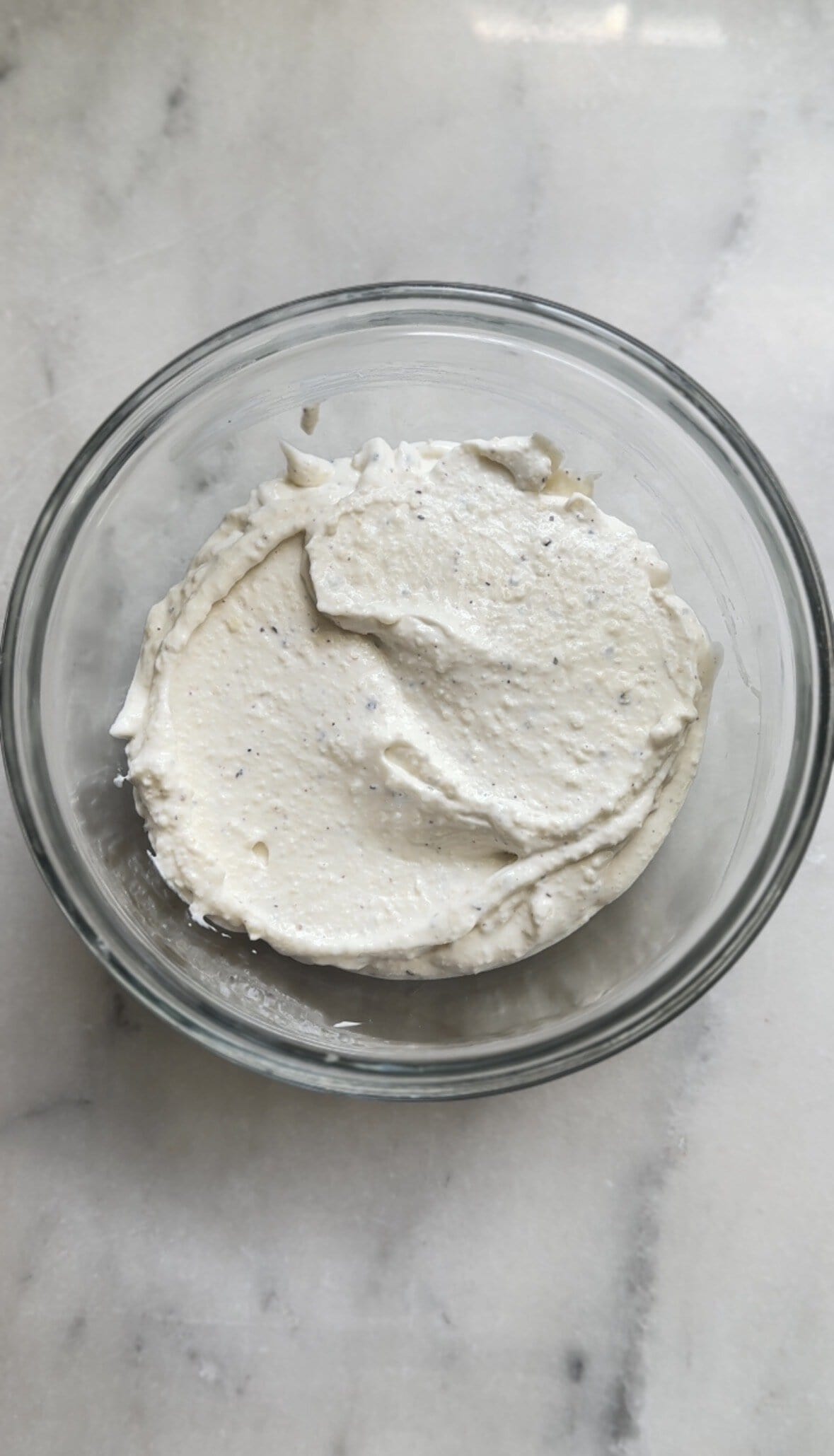Blended cacio e pepe mac and cheese cottage cheese sauce in a bowl.