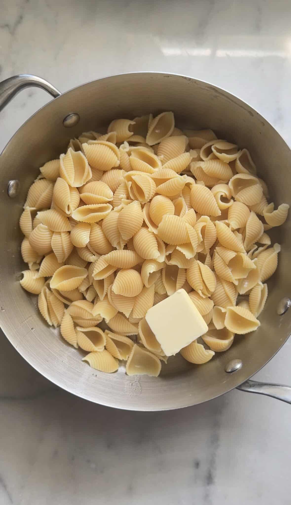 Add 1 tablespoon of butter into the protein pasta.