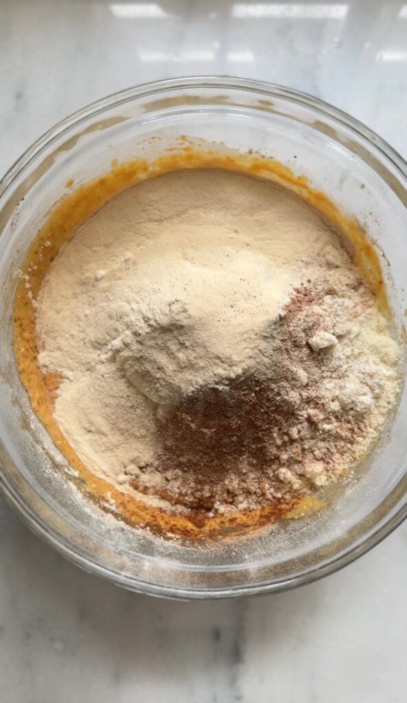 Add the protein powder to the rest of the dry ingredients in the same bowl.