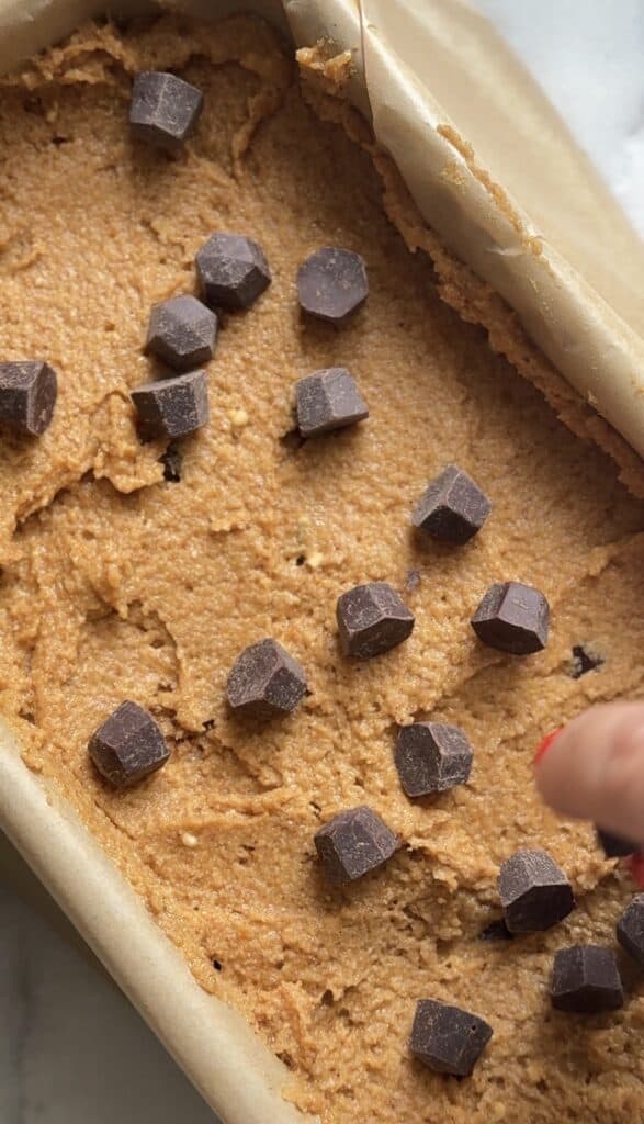 Top the Gluten Free Protein Pumpkin Bread with more chocolate chips.