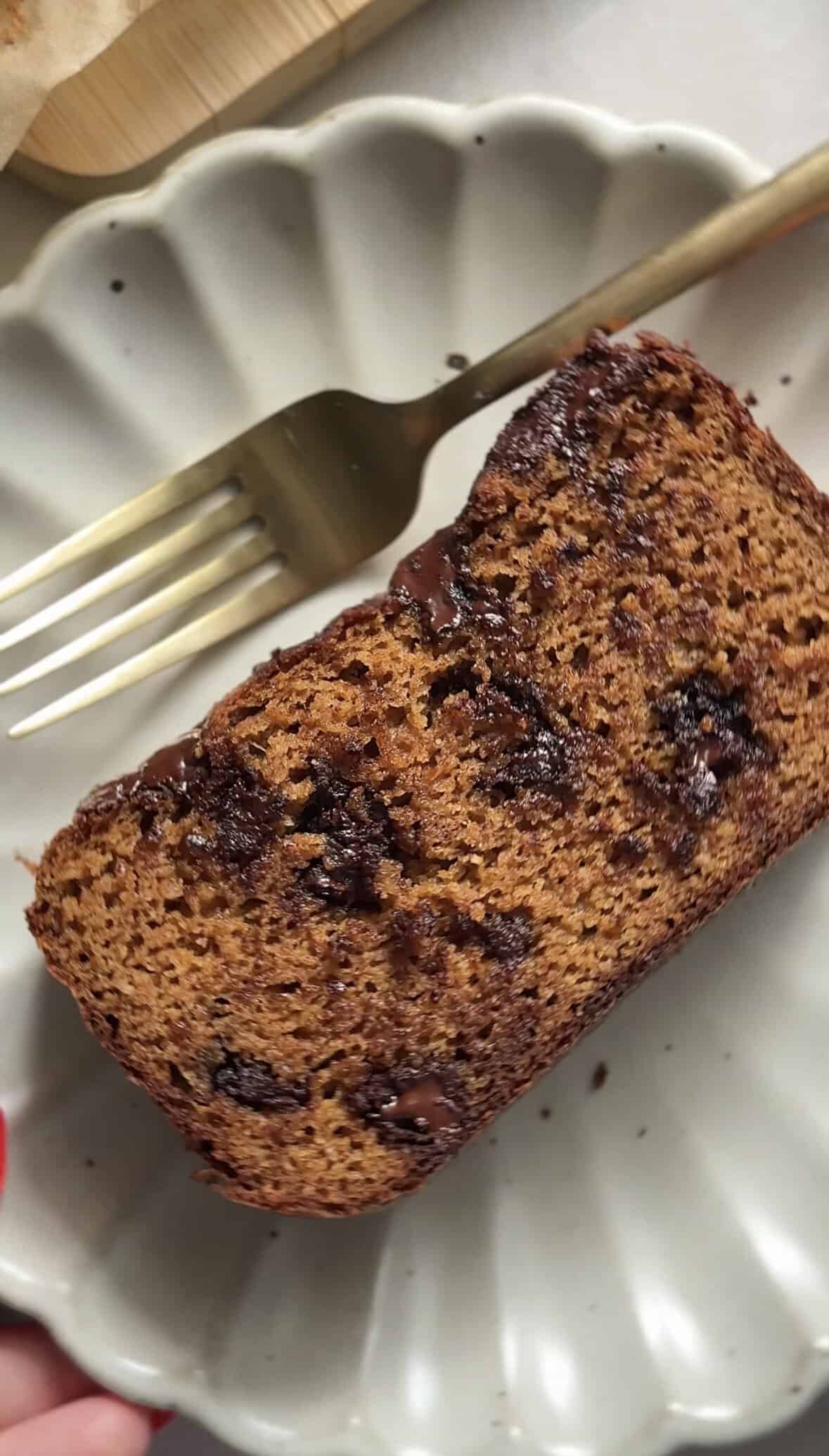 Gluten Free Protein Pumpkin Bread slice on a plate with a fork.