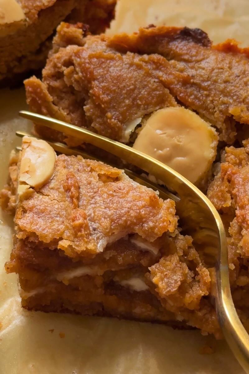 fork slicing into a pumpkin cottage cheese blondie