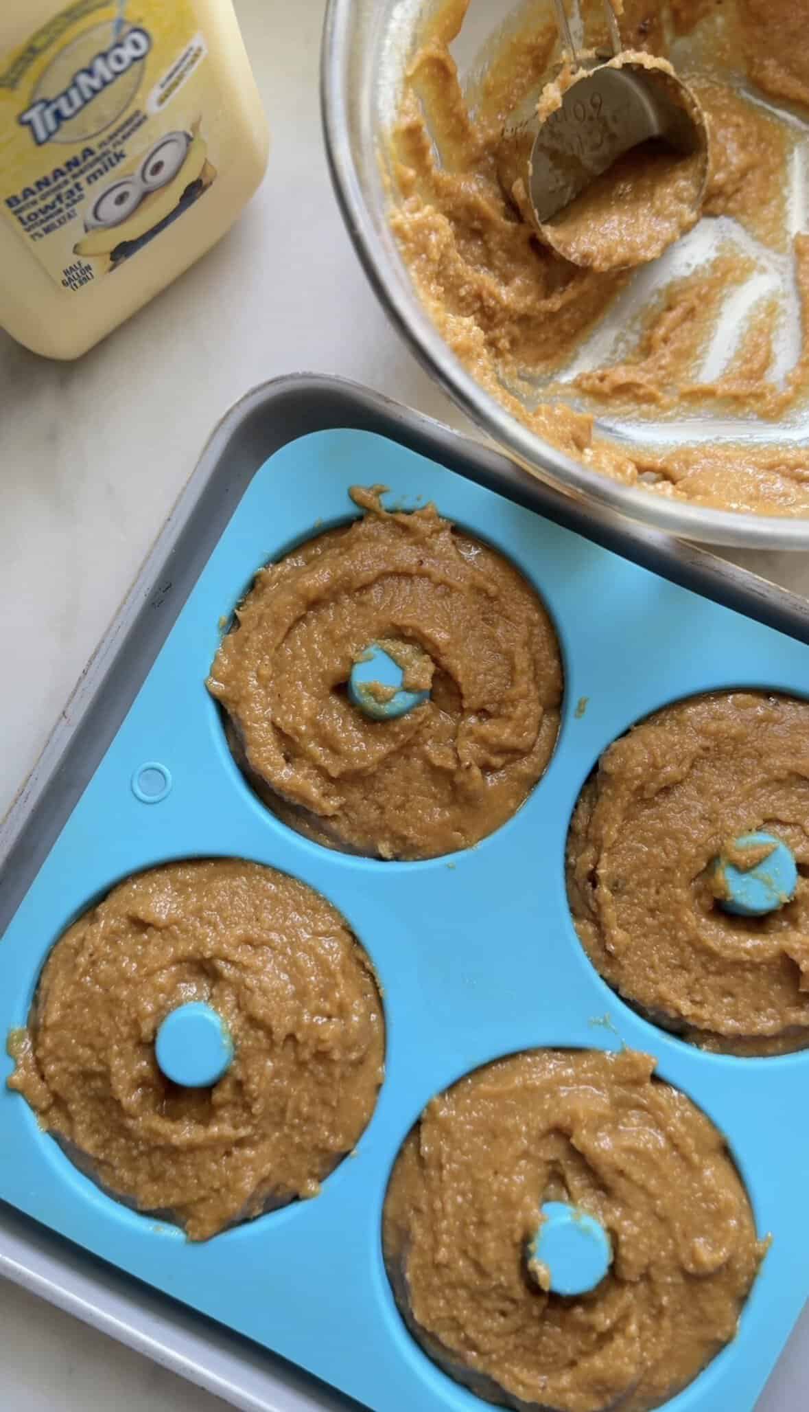 Fill the silicone donut mold all the way full with the banana donut batter.