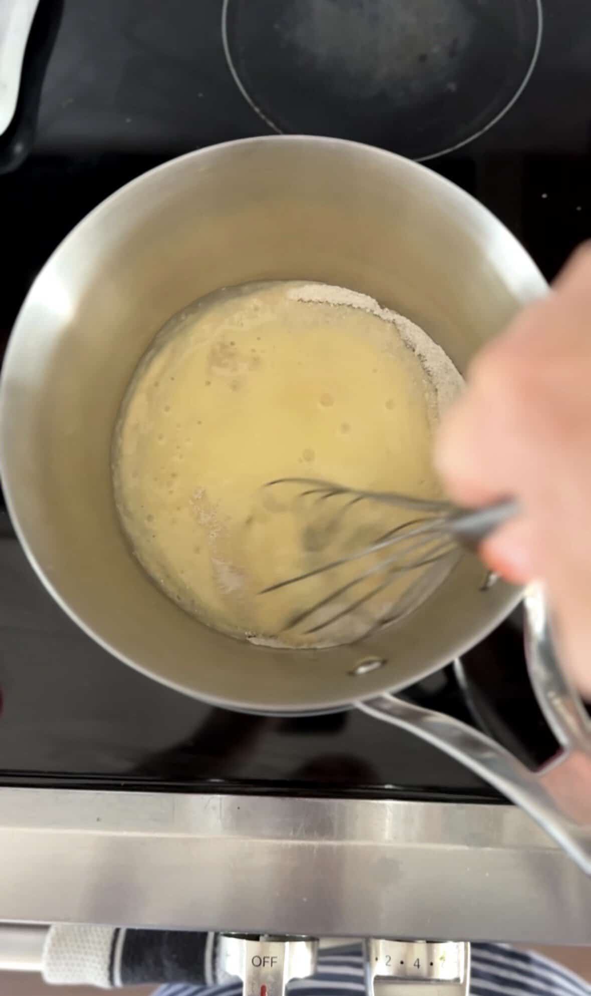 Whisk the banana frosting mixture in the saucepan with the heat.