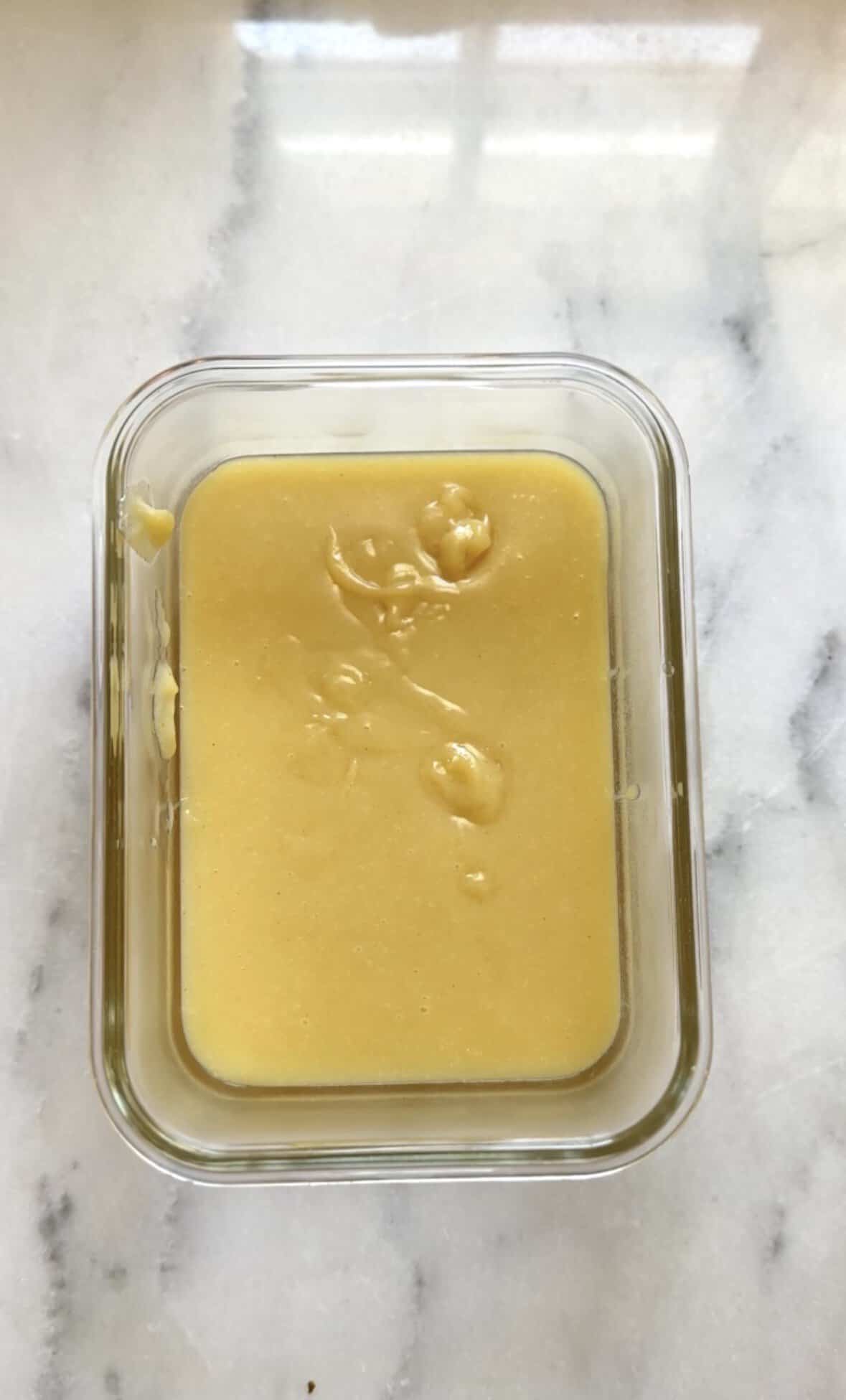 Pour the frosting base in a heat proof container.