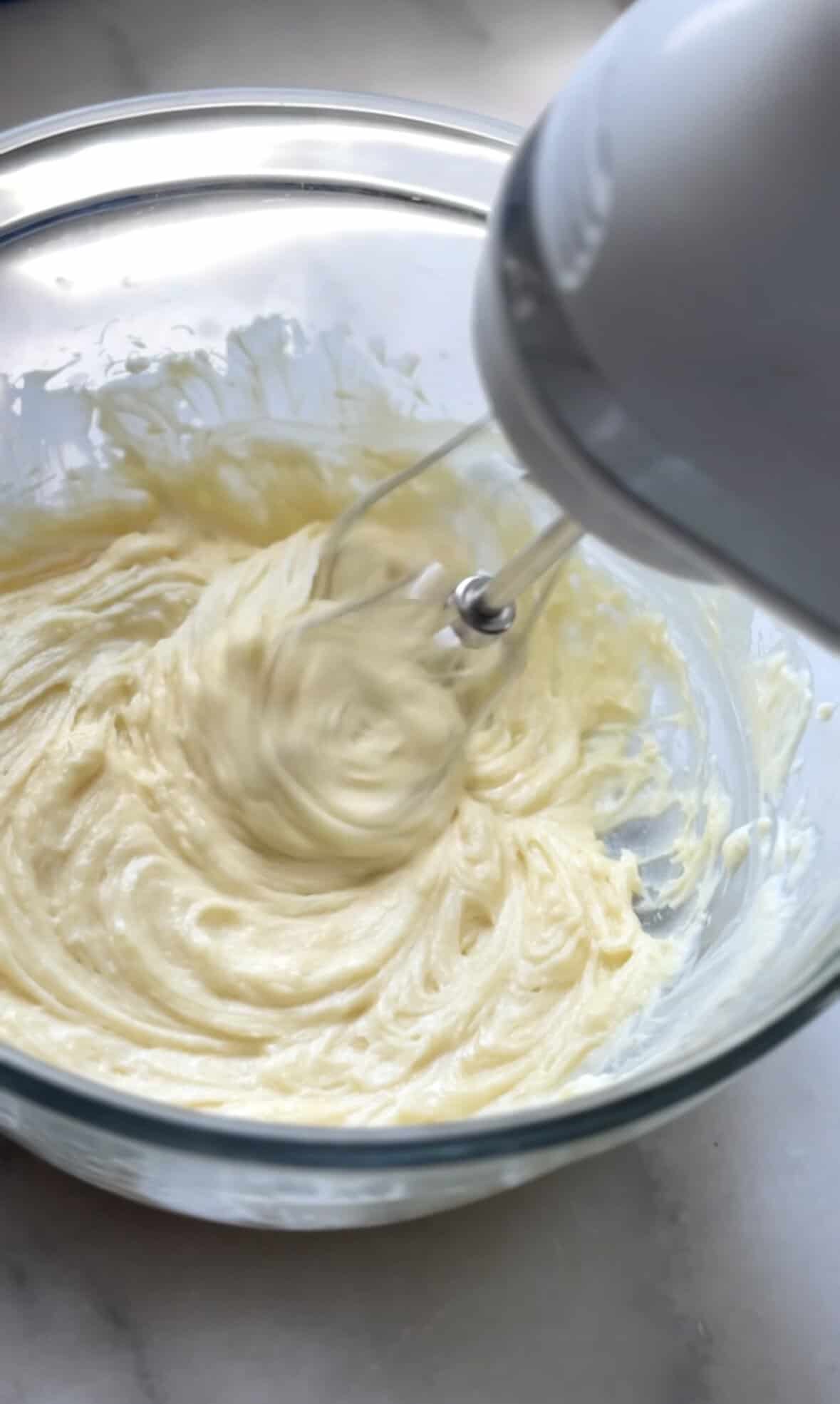 Mix all the frosting ingredients together with a hand mixer.