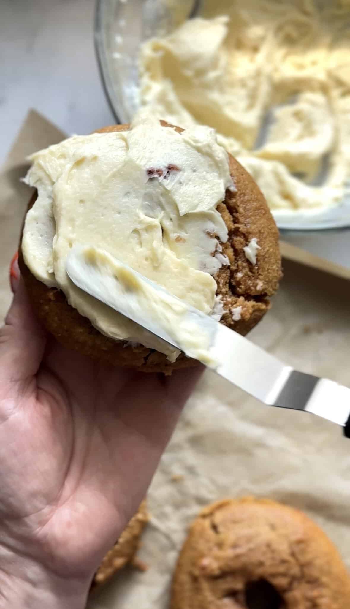 Frost the cooled banana donuts with the frosting with a butter knife.