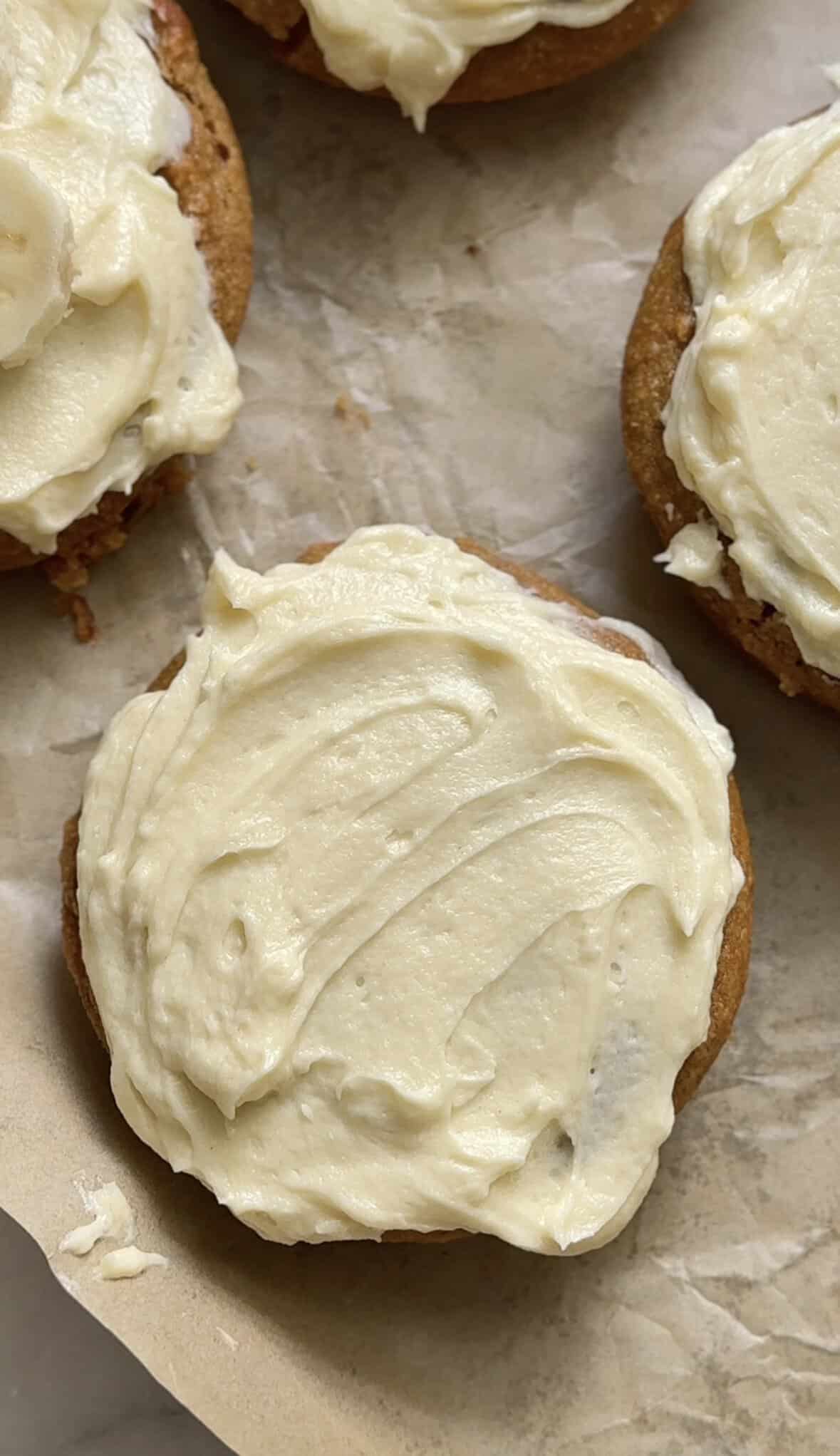 Completely frost each banana donut to your liking.