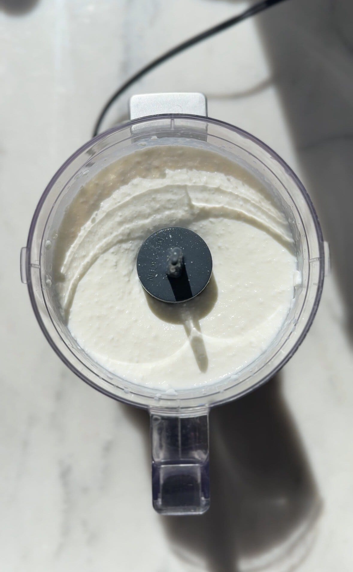 Blended cottage cheese in the food processor.