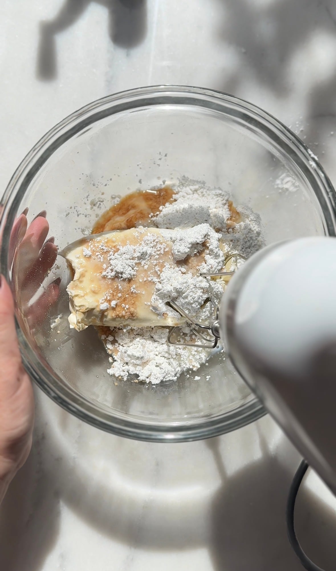 Add the cream cheese frosting ingredients into a bowl.