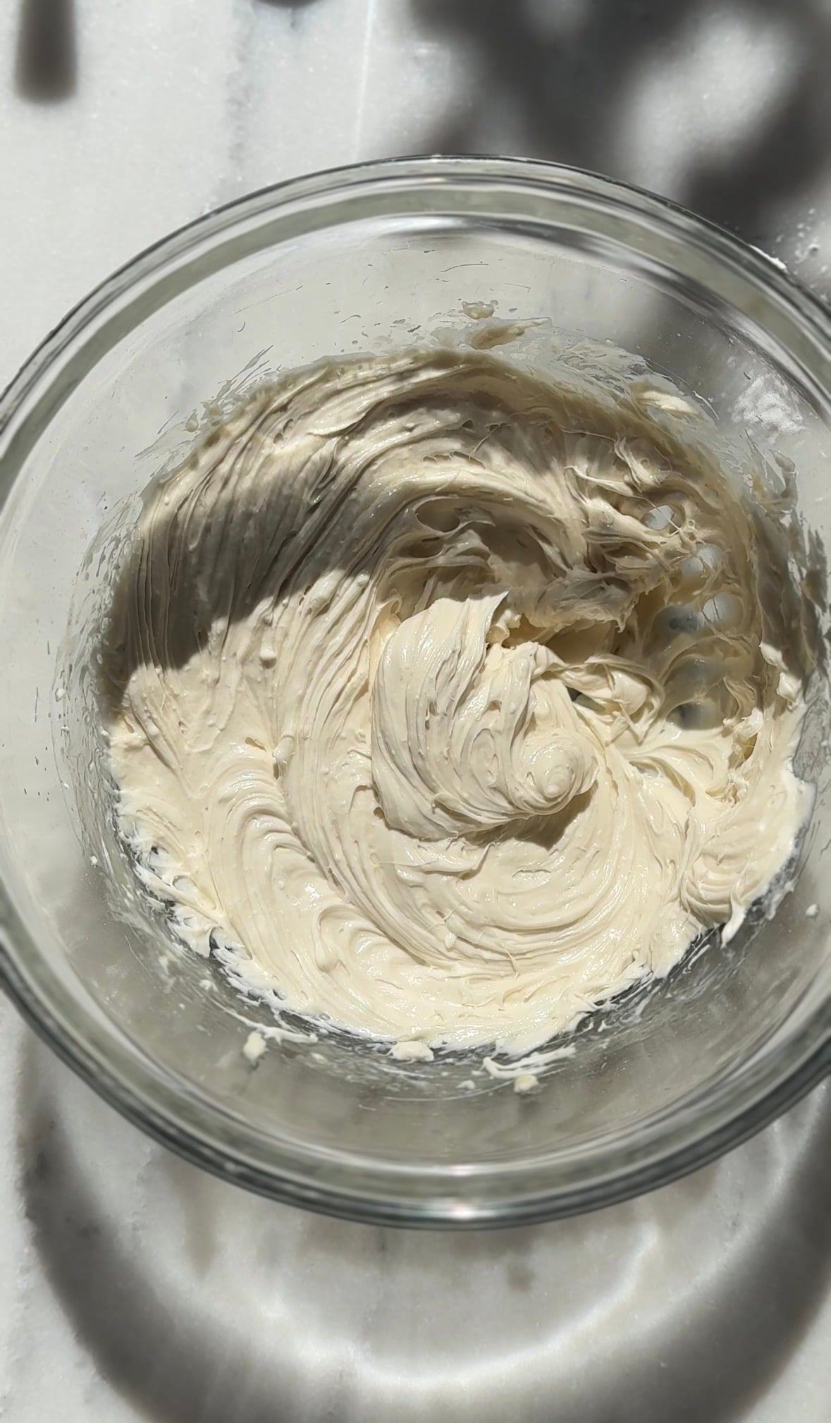 Mix the cream cheese frosting until all the ingredients are all mixed together.
