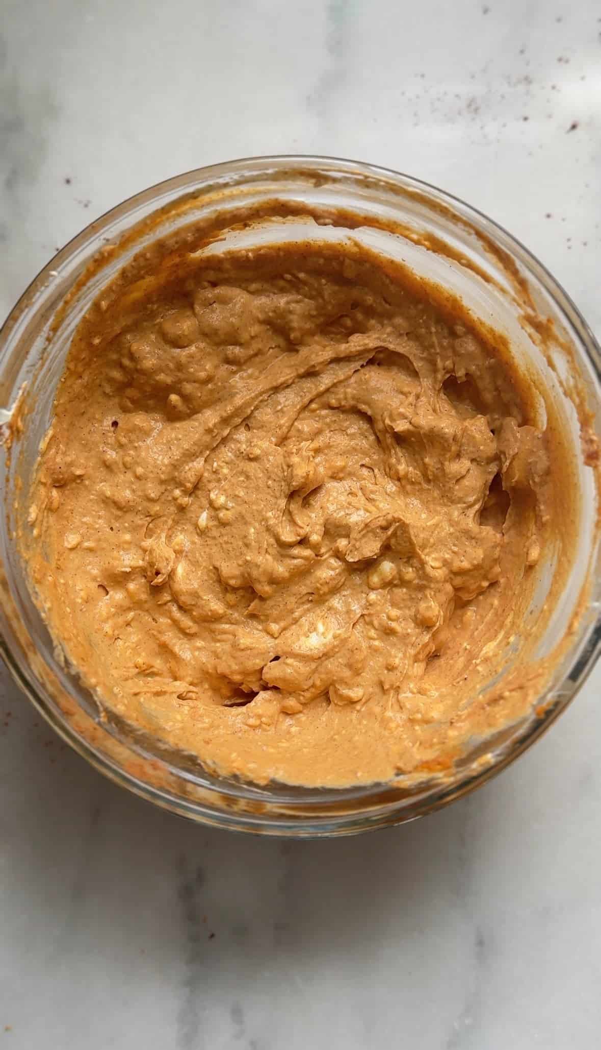 Mixed pumpkin cream cheese base in a bowl.