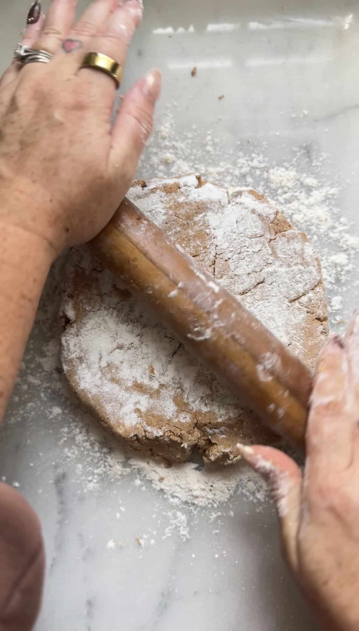 Rolling out the Pumpkin Cottage Cheese Scone dough with a rolling pin.