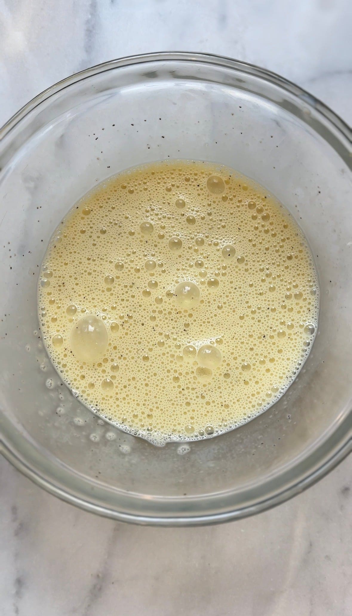 Mix the salt and pepper to the bowl with the eggs and milk.