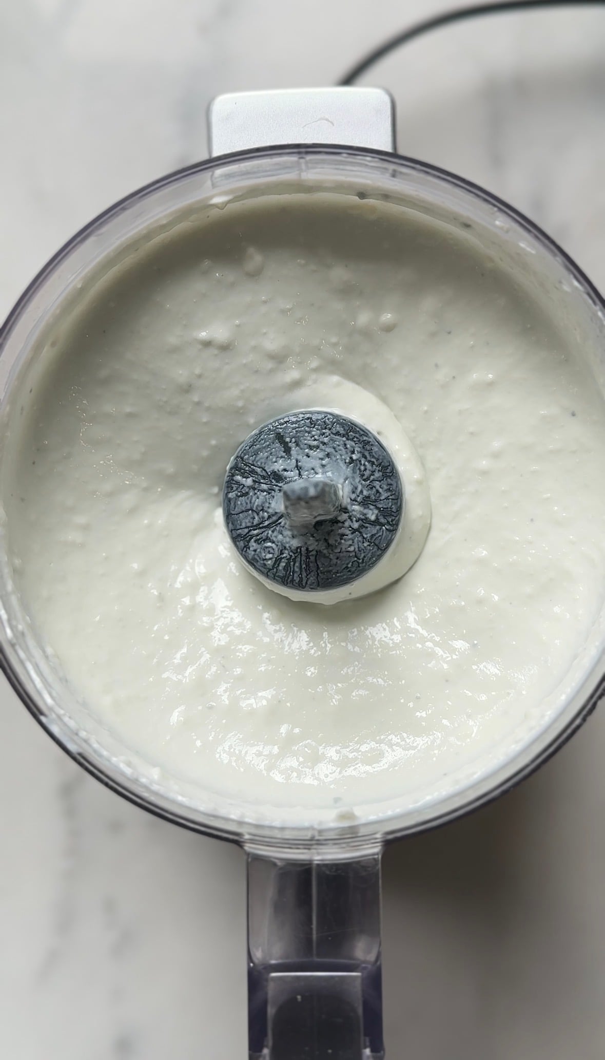 Blended the greek yogurt and both cheeses in the food processor until smooth.
