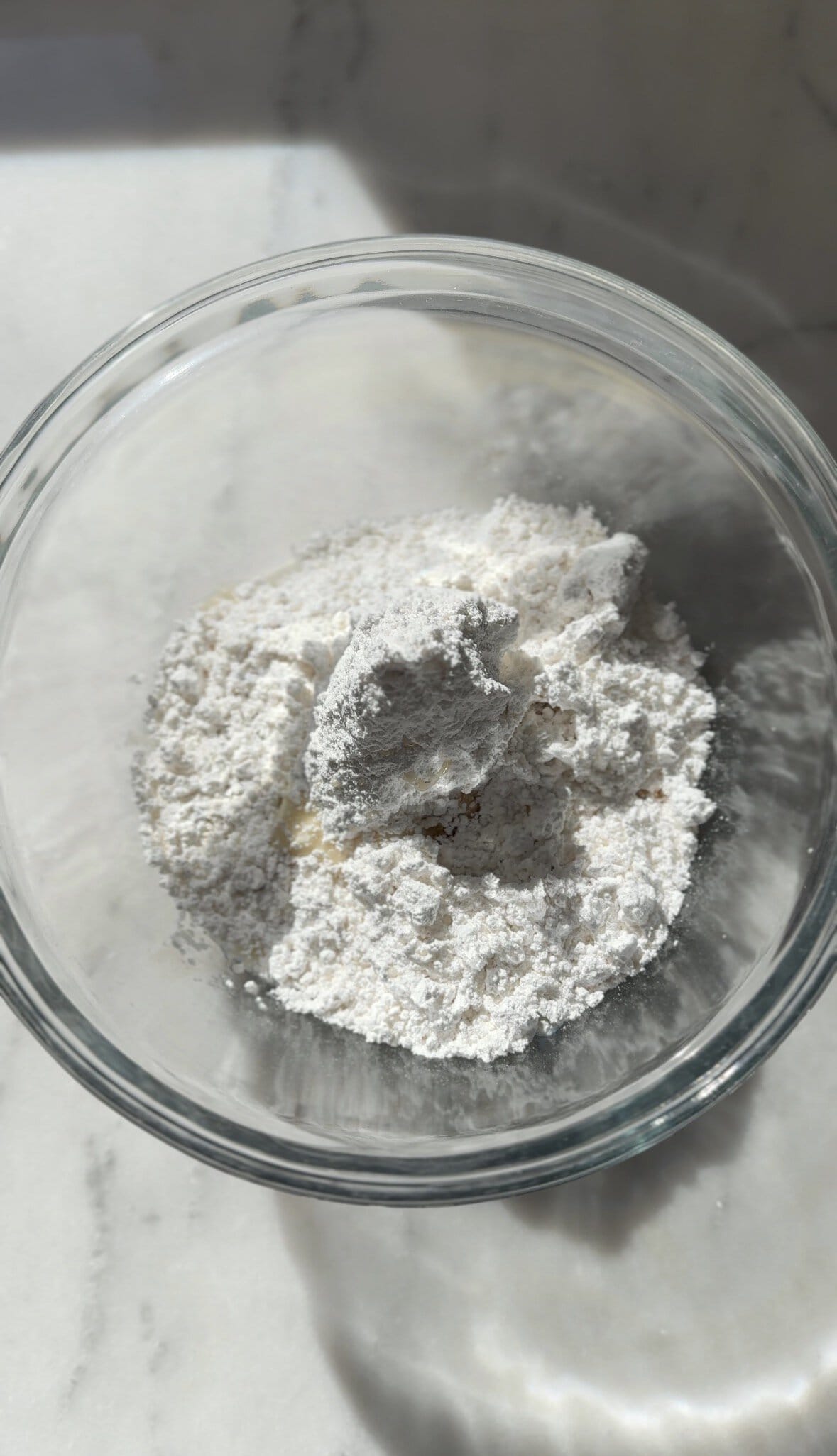 Add the ingredients of the cream cheese frosting to a bowl.