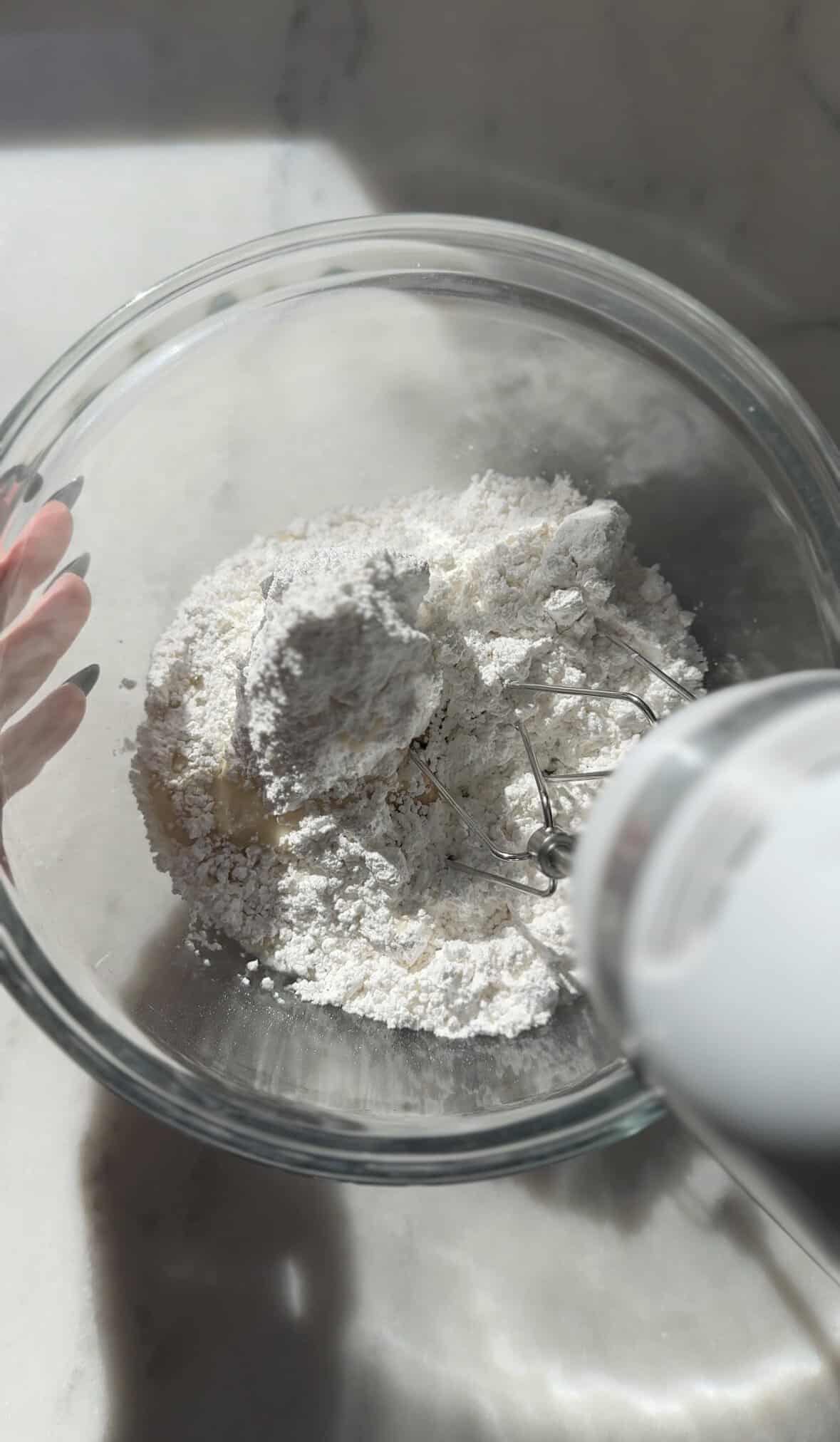 Mix the ingredients of the cream cheese frosting in a bowl.