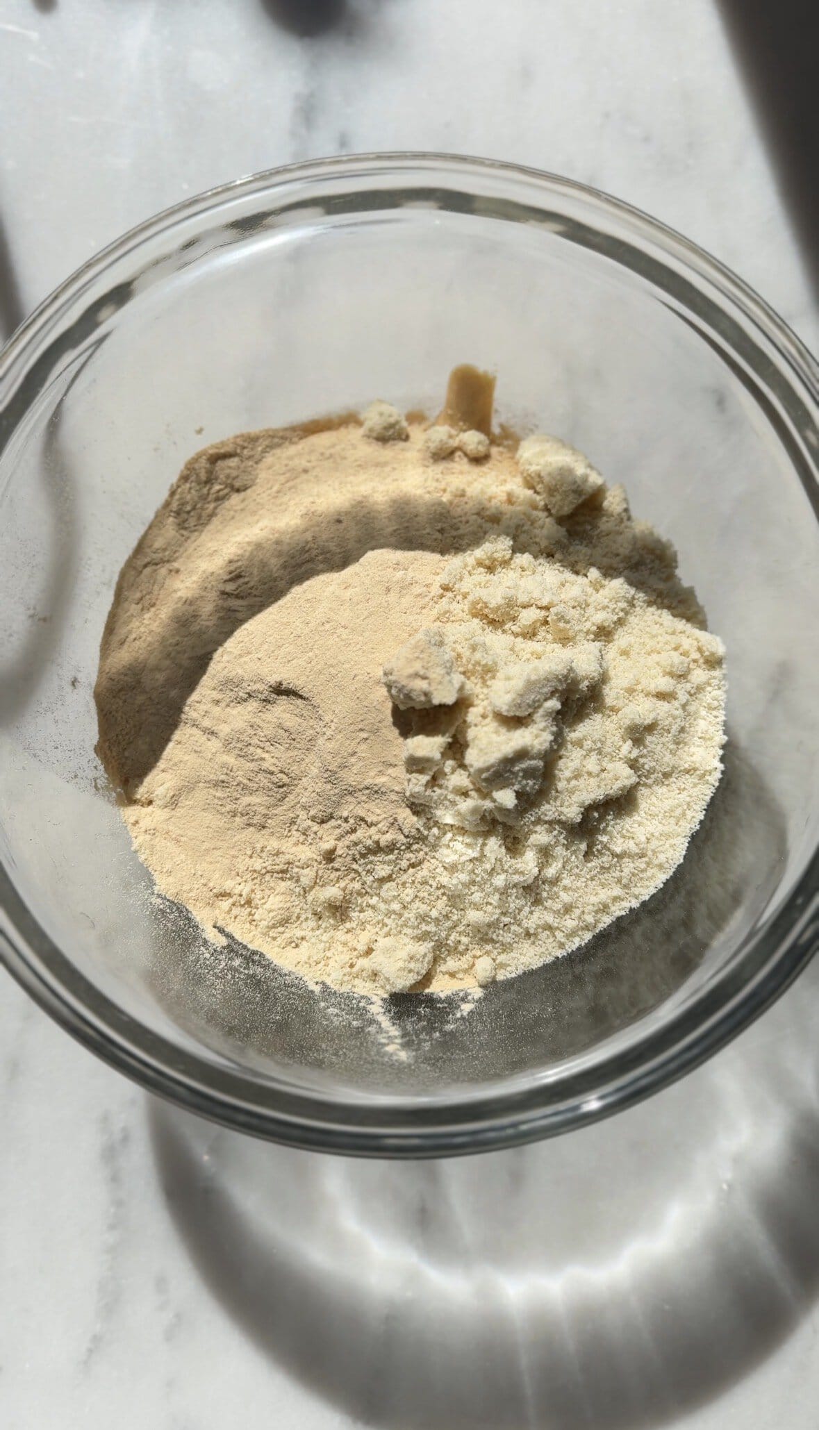Pour all the dry ingredients of the Pumpkin Cottage Cheese Cookie Dough into the bowl.