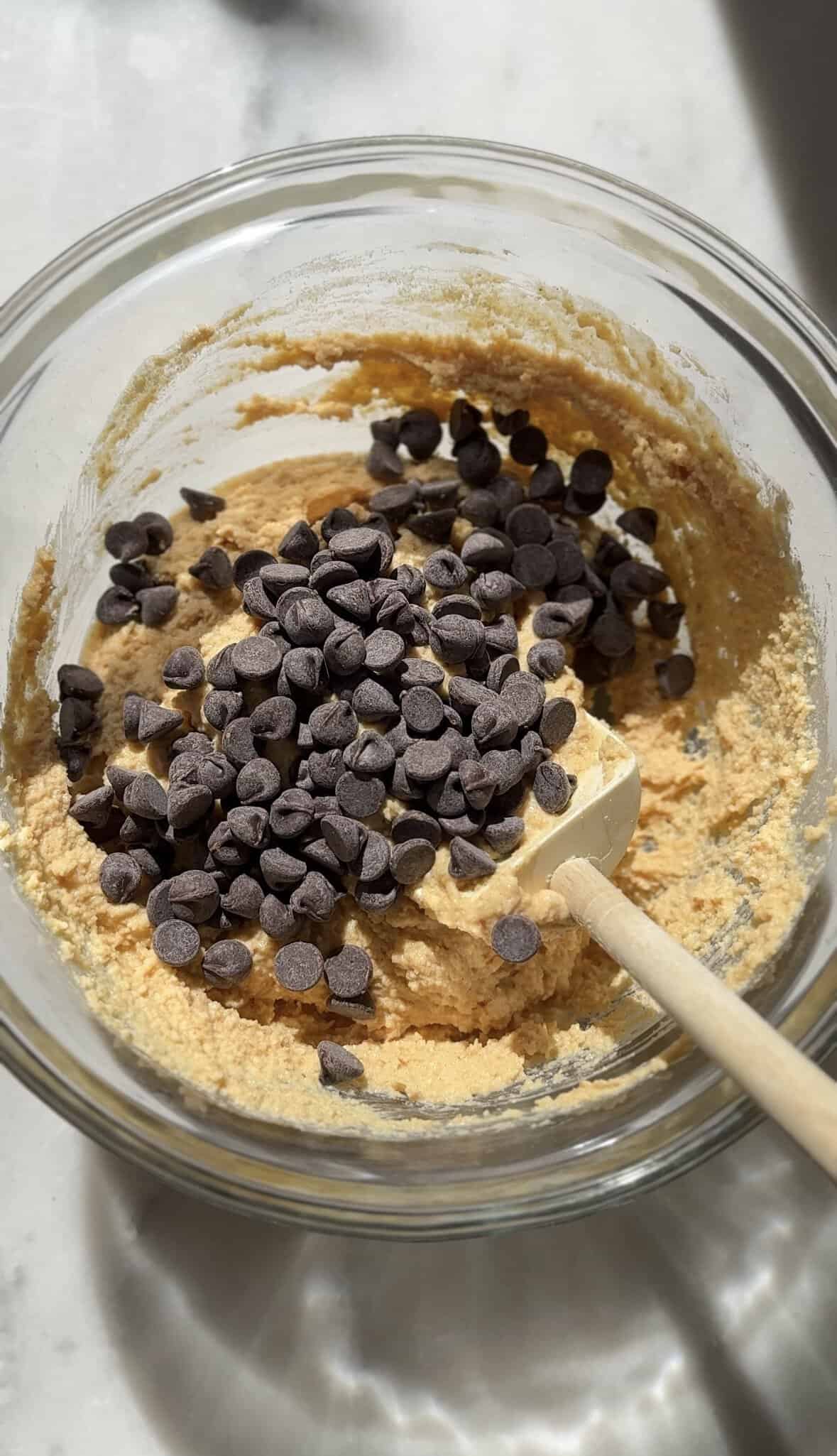 Add the chocolate chips to the bowl with the Pumpkin Cottage Cheese Cookie Dough.